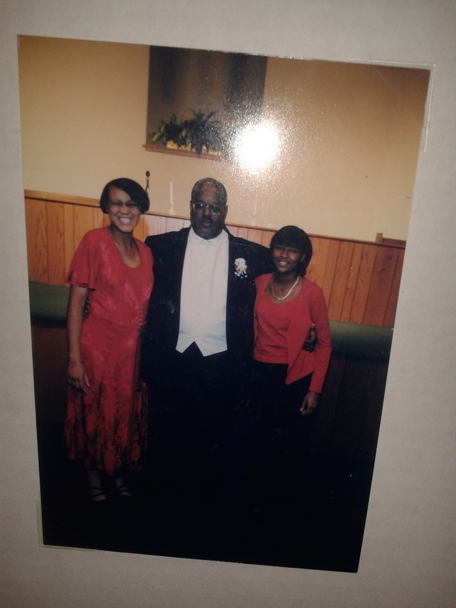 Gerald with M'rinda and Dontae dressed up at church