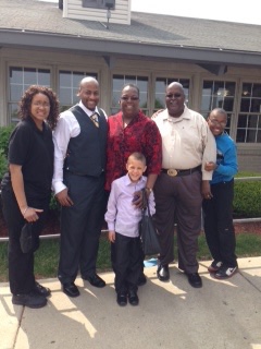 Gerald with family outside church