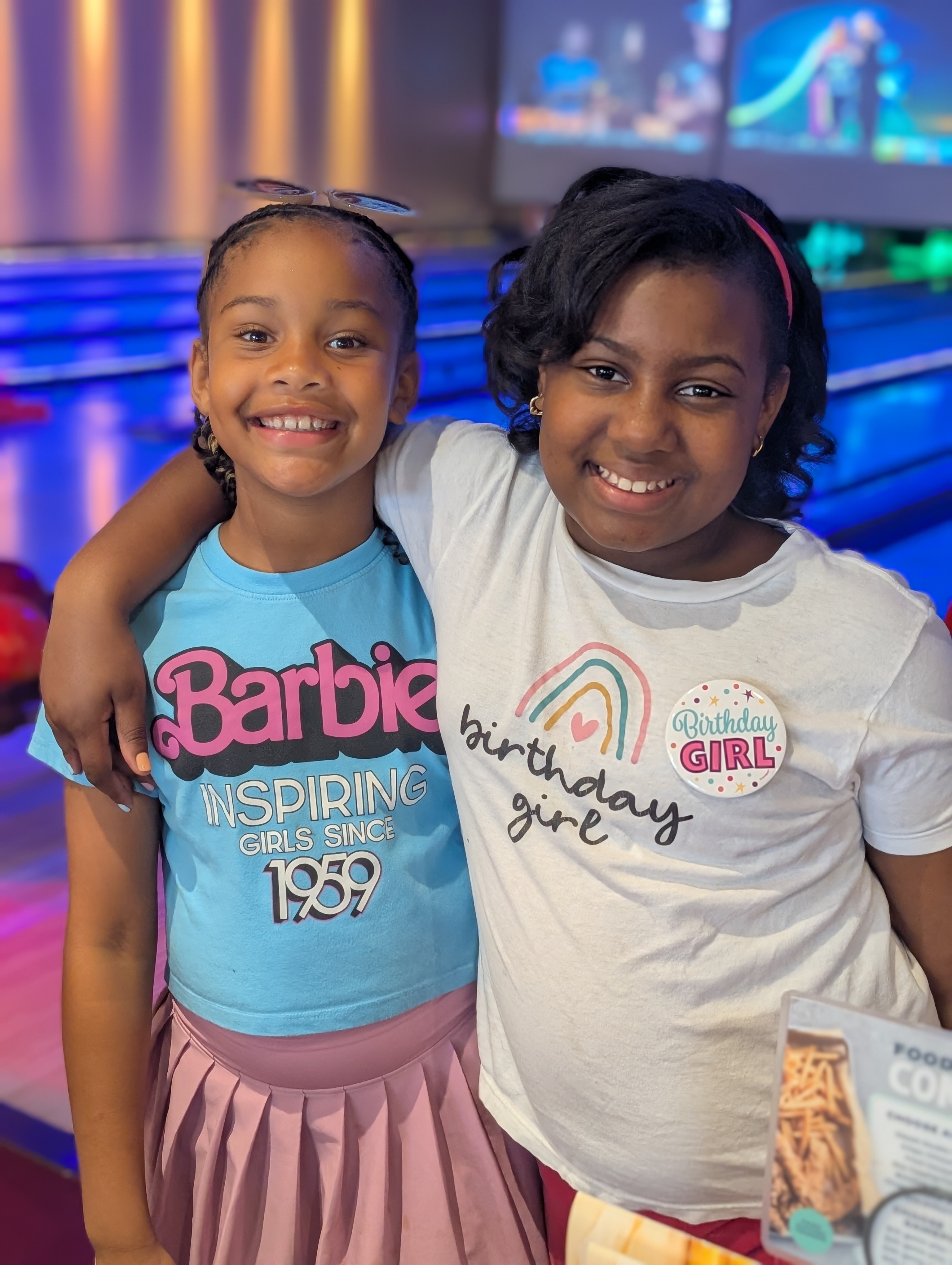 Best friends at a bowling birthday party