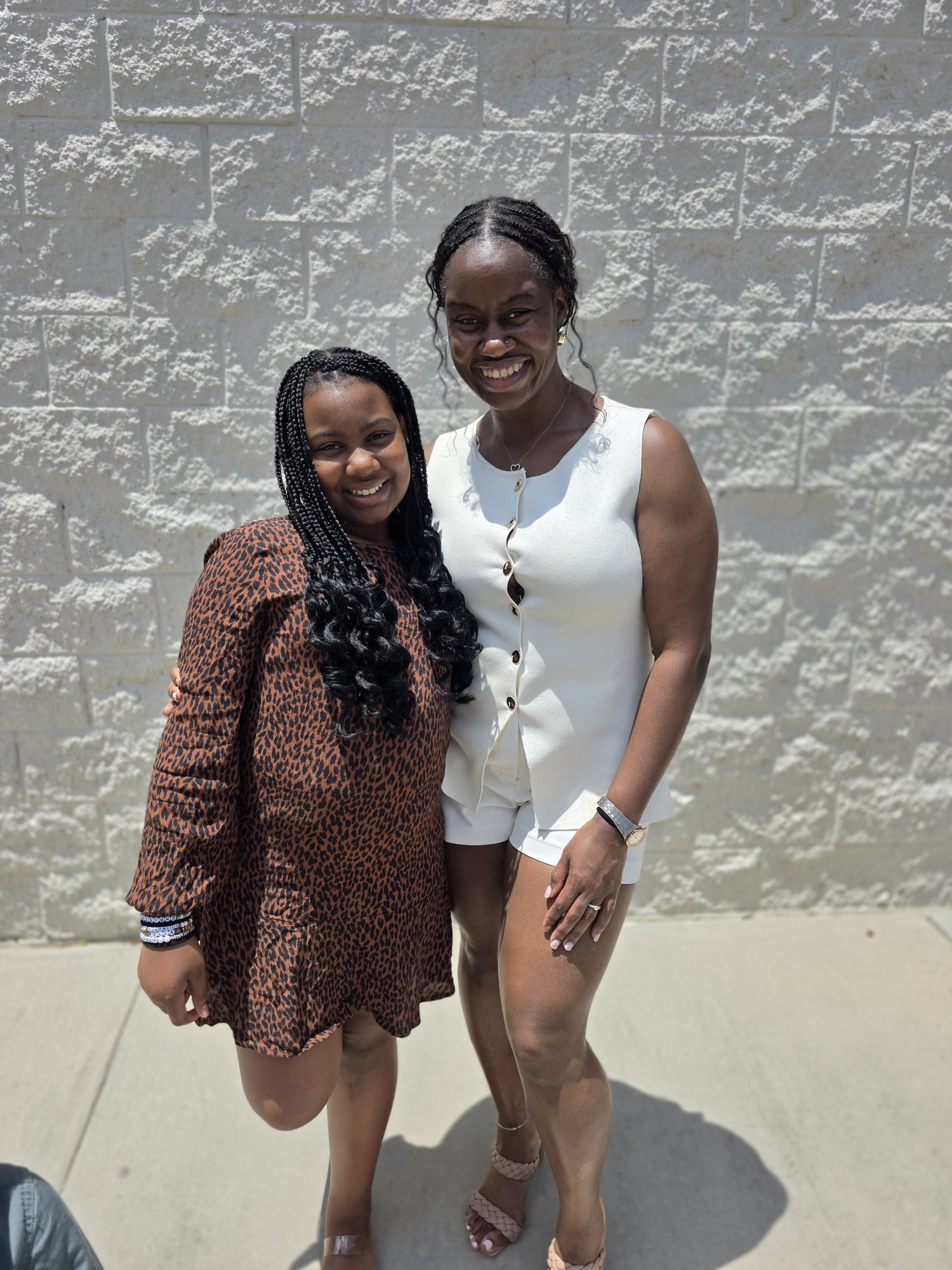 Alyscia and her older daughter at church