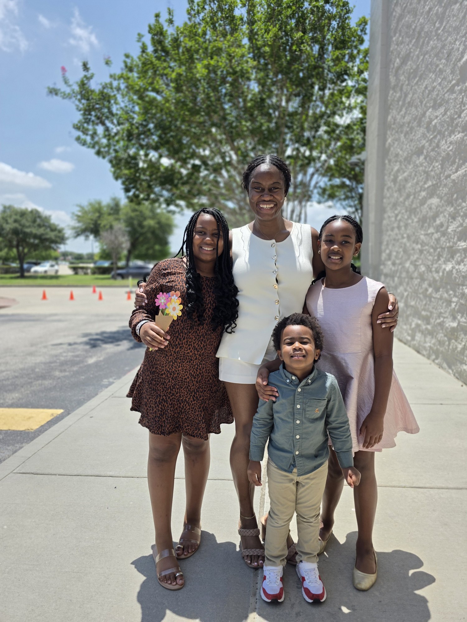 Alyscia and the children at church on Mother's Day 2026